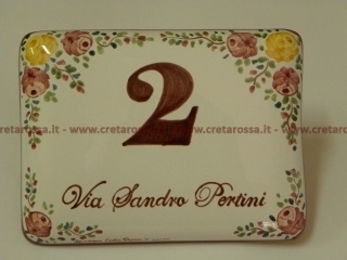 cod.art: nc106 - Mattonella in ceramica leggermente bombata cm 17x13 circa con decoro "Rosa spina" e scritta personalizzata. 